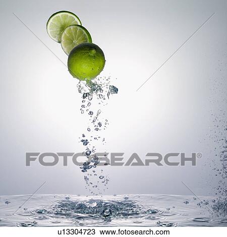 Stock Image - Limes and water. Fotosearch