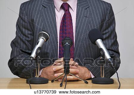 Man in front of microphones View Large Photo Image Stock Photo - Man in front of microphones. Fotosearch