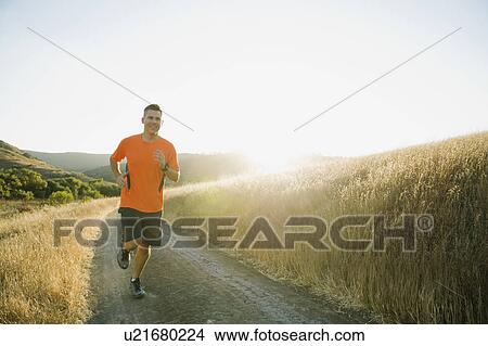 Picture - Man jogging. Fotosearch