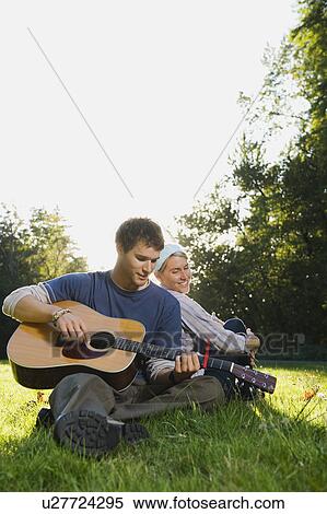 Stock Photography - Man playing guitar. Fotosearch