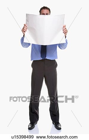 Man reading newspaper View Large Photo Image Stock Photo - Man reading newspaper. Fotosearch