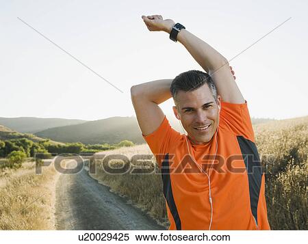 Man stretching View Large Photo Image Stock Photography - Man stretching. Fotosearch