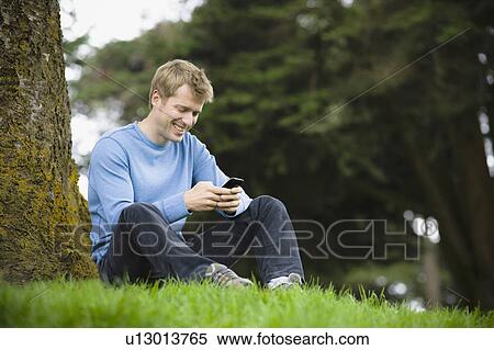 Man texting View Large Photo Image Stock Photography - Man texting. Fotosearch