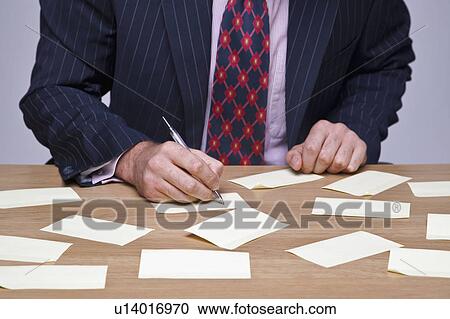 Man writing notes View Large Photo Image Stock Image - Man writing notes. Fotosearch