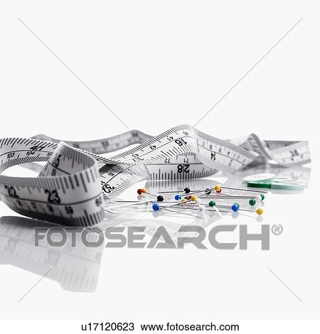 Measuring tape and pushpins View Large Photo Image Stock Image - Measuring tape and pushpins. Fotosearch