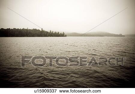 Misty lake View Large Photo Image Stock Photo - Misty lake. Fotosearch