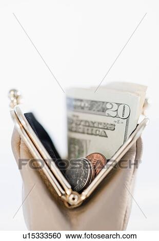 Stock Image - Money in change purse. Fotosearch