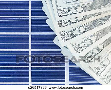 Money on solar panels View Large Photo Image Stock Photograph - Money on solar panels. Fotosearch