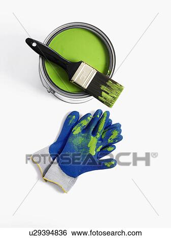 Stock Photograph - Paint brush and gloves. Fotosearch