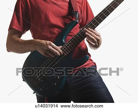 Person playing electric guitar View Large Photo Image Picture - Person playing electric guitar. Fotosearch