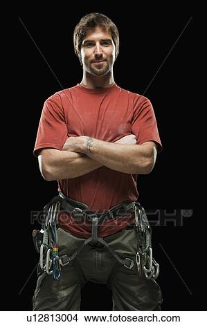 Portrait of male climber wearing harness View Large Photo Image Picture - Portrait of male climber wearing harness. Fotosearch