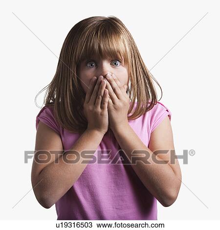 Stock Image - Portrait of surprised young girl. Fotosearch