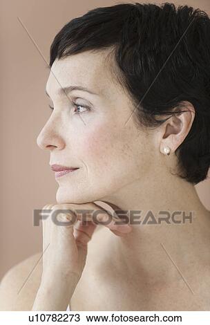 Stock Image - Portrait of woman. Fotosearch