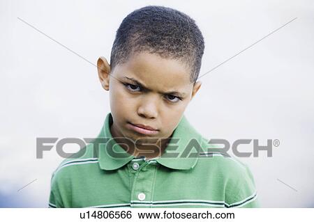 Stock Photograph - Portrait of young boy. Fotosearch