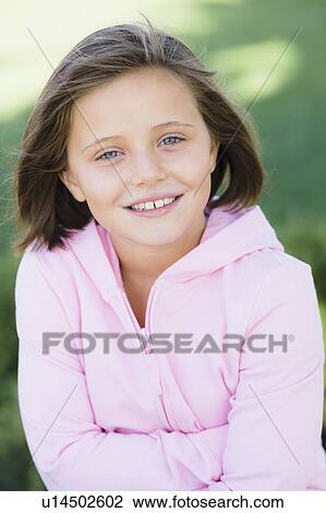 Stock Image - Portrait of young girl. Fotosearch