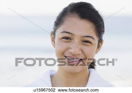 Stock Image - Portrait of young girl. Fotosearch