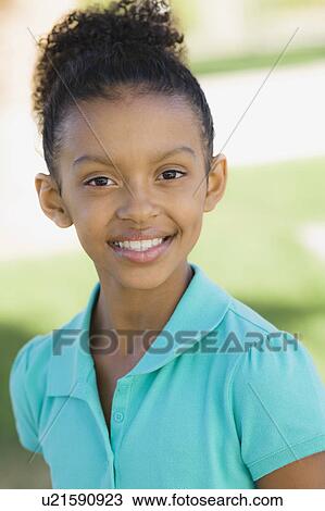 Stock Image - Portrait of young girl. Fotosearch