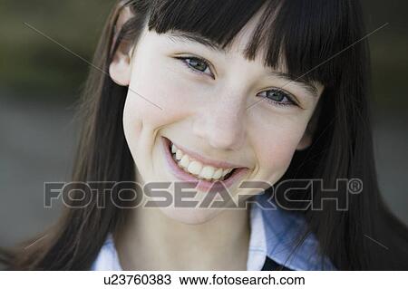 Stock Image - Portrait of young girl. Fotosearch