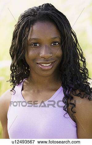 Stock Photo - Portrait of young girl. Fotosearch