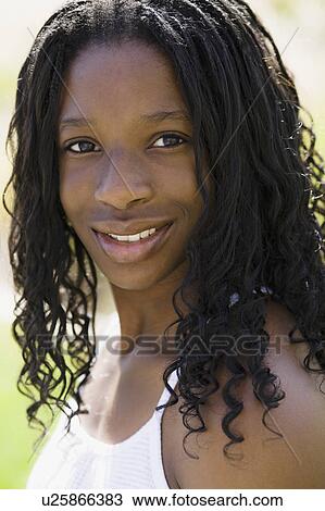 Portrait of young woman View Large Photo Image Stock Image - Portrait of young woman. Fotosearch