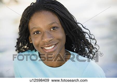 Stock Photo - Portrait of young woman. Fotosearch