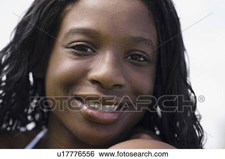 Stock Photograph - Portrait of young woman. Fotosearch