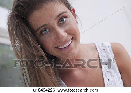 Stock Photograph - Portrait of young woman. Fotosearch