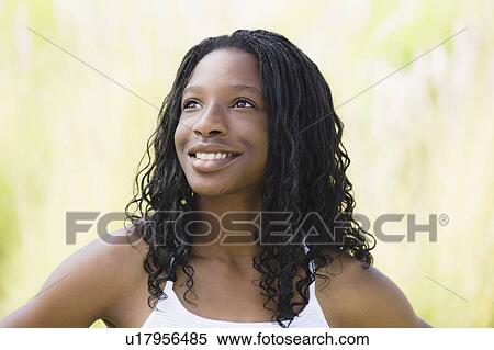 Stock Photography - Portrait of young woman. Fotosearch