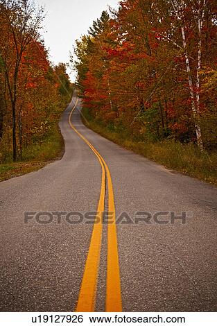 Stock Photograph - Road in autumn. Fotosearch