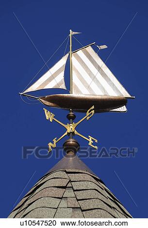 Stock Image - Sailboat weathervane. Fotosearch