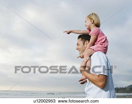 Stock Image - Shoulder ride. Fotosearch