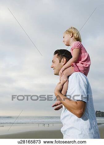 Stock Image - Shoulder ride. Fotosearch