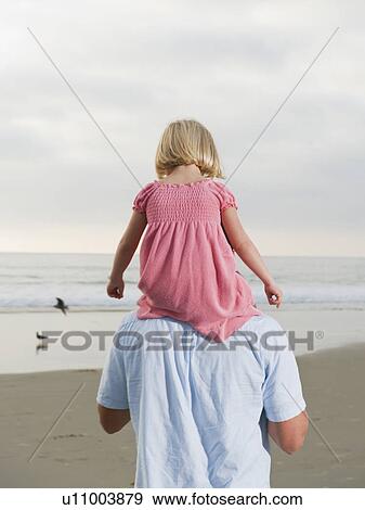 Shoulder ride View Large Photo Image Stock Photo - Shoulder ride. Fotosearch