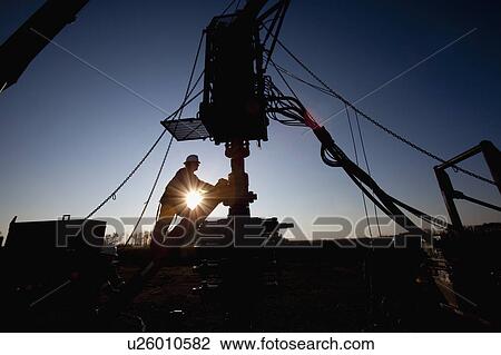 Silhouette of industrial worker View Large Photo Image Stock Image - Silhouette of industrial worker. Fotosearch