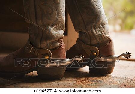 Spurs on cowboy boots View Large Photo Image Picture - Spurs on cowboy boots. Fotosearch