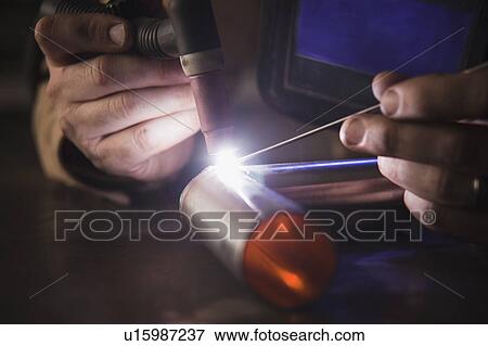 Steel worker in metal shop View Large Photo Image Stock Photo - Steel worker in metal shop. Fotosearch