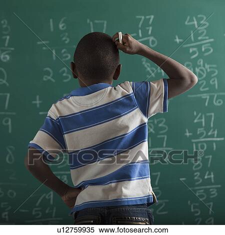 Student in front of chalkboard View Large Photo Image Stock Photography - Student in front of chalkboard. Fotosearch