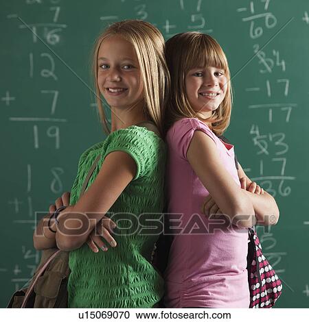 Stock Image - Students in classroom. Fotosearch