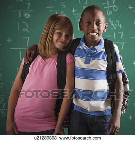 Stock Photo - Students in classroom. Fotosearch