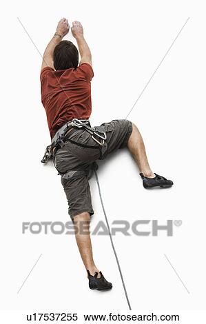 Studio shot of a male climber View Large Photo Image Stock Photography - Studio shot of a male climber. Fotosearch