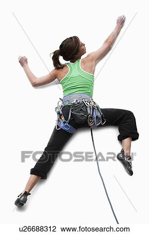 Stock Image - Studio Shot of a woman climber. Fotosearch