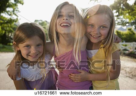 Stock Image - Three young girls. Fotosearch