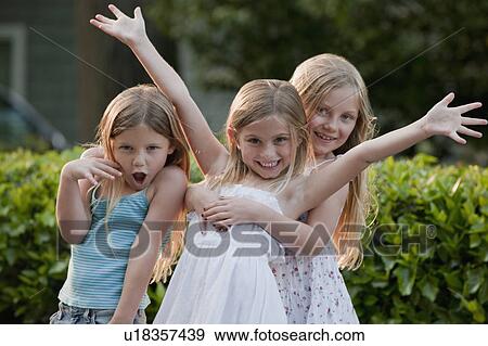 Stock Photo - Three young girls. Fotosearch