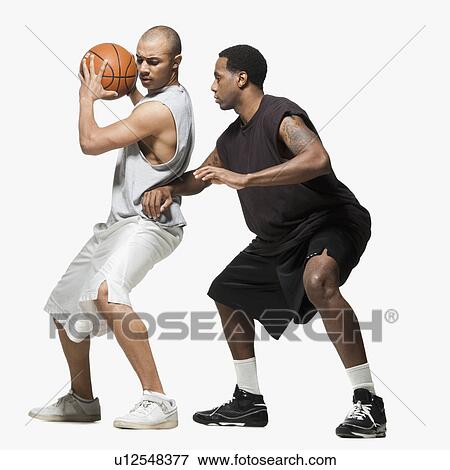 Two basketball players View Large Photo Image Stock Photo - Two basketball players. Fotosearch