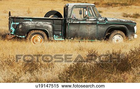 Stock Photography - Vintage pickup truck in field. Fotosearch