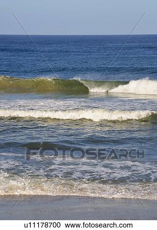 Waves at the beach View Large Photo Image Stock Image - Waves at the beach. Fotosearch