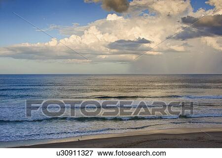 Stock Photo - Waves at the beach. Fotosearch