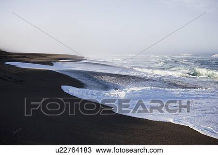 Stock Image - Waves crashing. Fotosearch