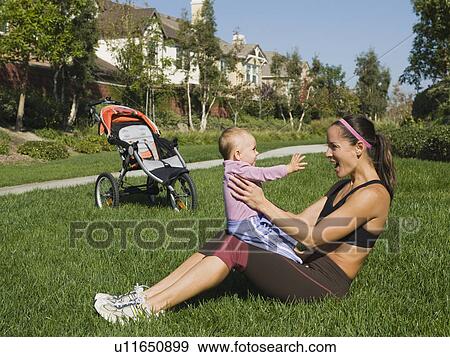 Stock Photo - Woman and baby. Fotosearch