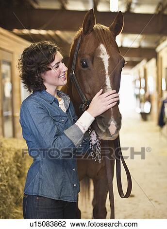 Woman and horse View Large Photo Image Stock Image - Woman and horse. Fotosearch
